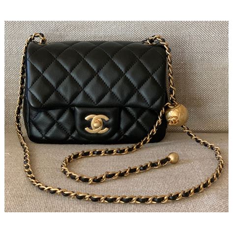 how to clean lambskin chanel bag|Chanel mini flap bag with top handle.